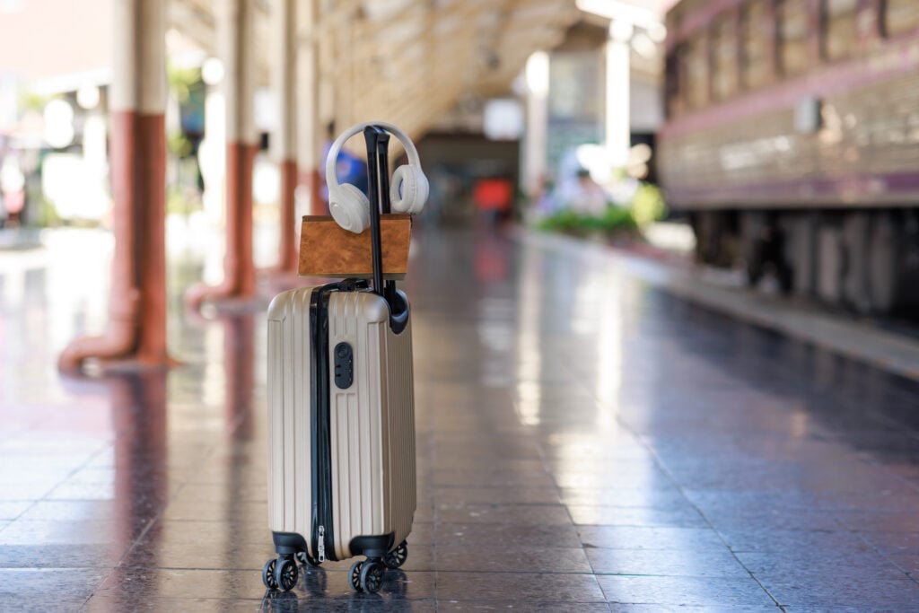 Suitcase With Headphones Waiting On Train Station 2026 03 27 02 17 03 Utc 1024x683